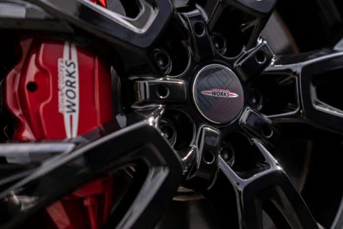 An upclose shot of the rims on a John Cooper Works Mini.